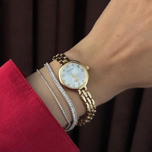 Justerbar vattentät damklocka, guldfärgad elegant armbandsur för kvinnor, vintagedesign, present till henne, rund urtavla