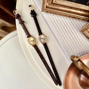 Orologio da donna vintage rotondo, cinturino in similpelle nera, quadrante bianco, design vintage, regalo per lei, numeri romani