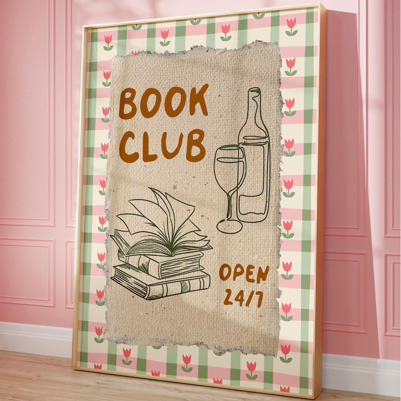 May include: A framed print with a gingham background and a vintage-style illustration of a stack of books, a glass of wine, and a bottle of wine. The text "BOOK CLUB OPEN 24/7" is printed on the print.