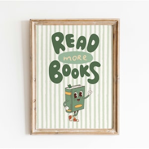 Könnte beinhalten: Ein grün-weiß gestreiftes Poster mit dem Text "READ MORE BOOKS" in grünen Buchstaben. Ein Comic-Buchcharakter mit grünem Einband, roten Schuhen und einem Lächeln zeigt auf den Text.