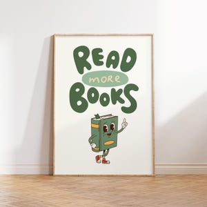 May include: A green and white poster with the text "READ more BOOKS" in a whimsical font. A cartoon book character with a green cover, red shoes, and a smiling face is pointing to the right.