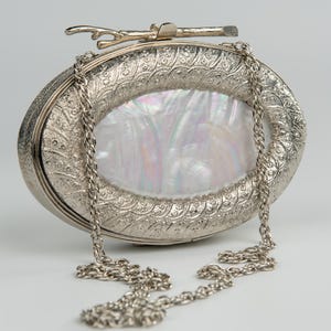 Unique clutch metal and natural shell