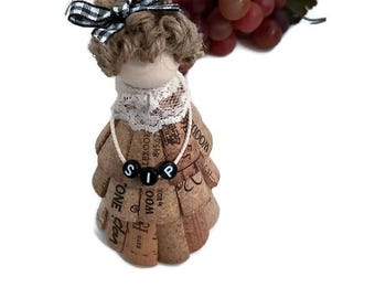 Recycled cork ‘SIP’ girl figurine