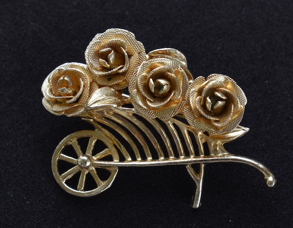 BROOKS Gold tone Floral Rose Wheelbarrow Brooch, … - image 1
