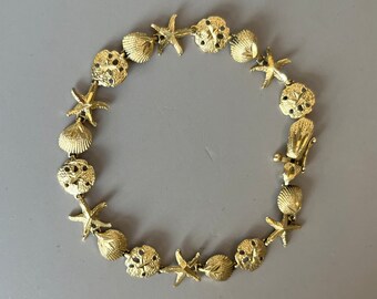 14kt Seashell, Sand dollar, Starfish Bracelet, 7-1/8”, 7.8g (M16)