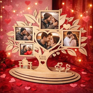 May include: A wooden tree-shaped photo display with five picture frames. The frames contain photos of couples. The tree has a heart-shaped cutout and the text "S.Aem Macrie". The display is on a tiered base. The overall design is romantic.
