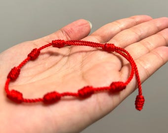 Pulseras de hilos rojos hecha a mano, pulseras de 7 nudos de protección , para amigos , parejas, familia , pulseras para regalos .