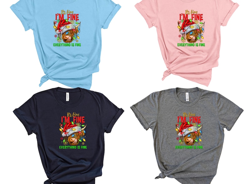May include: Four t-shirts in light blue, pink, navy, and gray, each featuring a graphic of a Highland cow wearing a Santa hat and Christmas lights. The text reads "It's fine, I'm fine, everything is fine."
