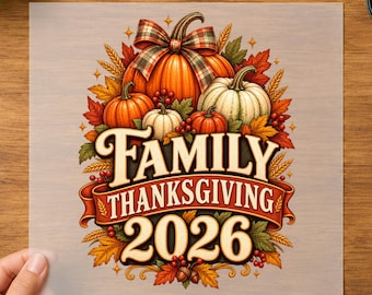 May include: A DTF transfer sheet featuring a graphic of pumpkins, autumn leaves, and wheat. The text reads FAMILY THANKSGIVING 2026. The design includes a plaid bow, red berries, and acorns, with the words READY TO PRESS HEAT TRANSFERS at the bottom.