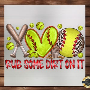 May include: A white background with a red heart shape made of two crossed baseball bats and a green softball. The heart is surrounded by smaller softballs and the text "RUB SOME DIRT ON IT" in red letters.