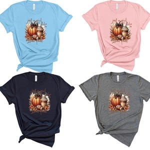 May include: Four different colored t-shirts with a graphic design of a pumpkin, football, and a coffee cup with the text "Just a girl who loves fall".