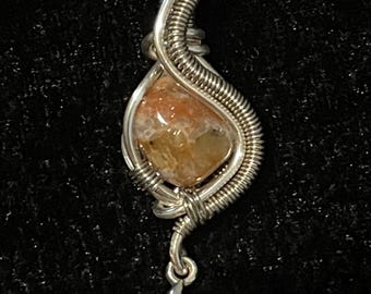 Wire wrapped Lake Erie stone with charm. Small