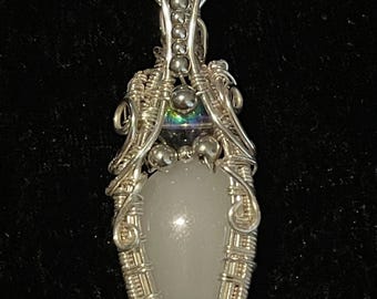Wire wrapped teardrop milky quartz with glass bead accents