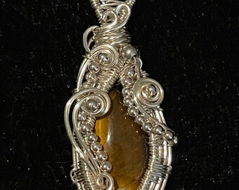 Wire wrapped tigers eye pendant