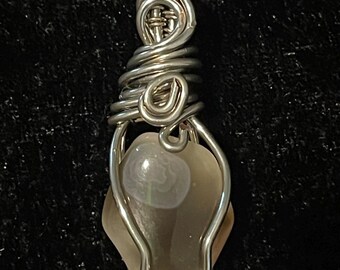 Wire wrapped Botswana agate. Medium size