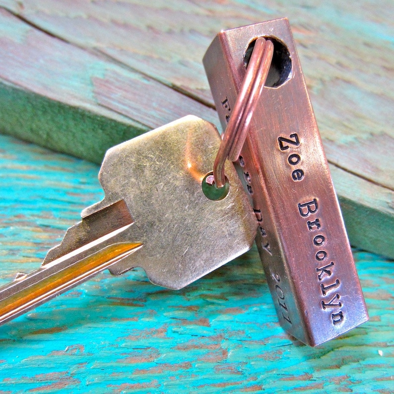 Our jewelry makes for a unique and personalized gift Each piece handcrafted in Bozeman,MT with an antique hammer Copper Bar Keychain