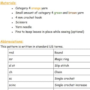 May include: A digital document page titled Materials and Abbreviations for a crochet pattern. It lists category 4 orange, green, and brown yarn, a 4 mm crochet hook, scissors, a yarn needle, and pins. A table defines US crochet abbreviations.