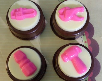 One dozen tool topped chocolate covered sandwich cookie Oreo party favors