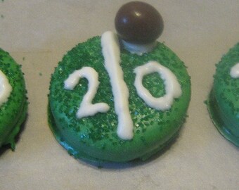 One dozen football yardlines with peanut candy football chocolate covered sandwich cookies