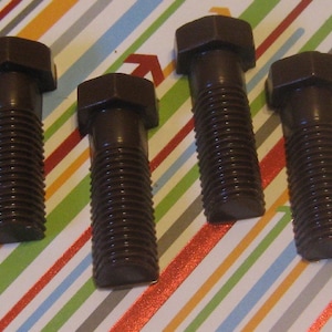 One dozen chocolate bolts carpenter auto builder party favors cupcake toppers