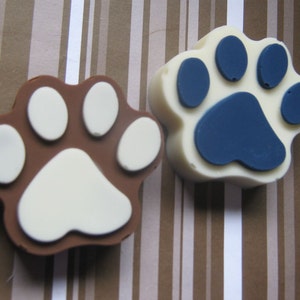 One dozen solid chocolate paw print candy pieces party favors