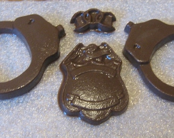 Chocolate handcuffs, chain, and police badge party favor