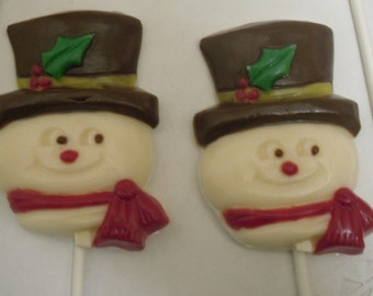 A dozen Snowman head lollipops