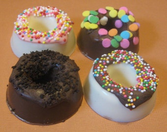 One dozen chocolate candy mini donuts with sprinkles