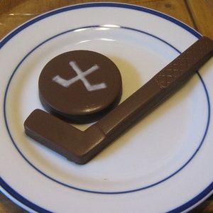 Solid chocolate hockey stick and hockey puck image 5