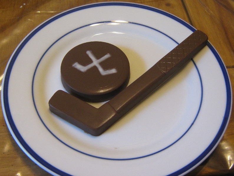 Solid chocolate hockey stick and hockey puck image 5