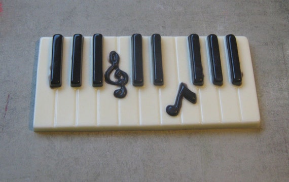 Solid chocolate piano keys keyboard with music note centerpiece cake topper