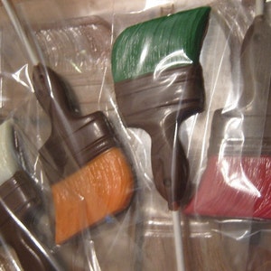 One dozen paintbrush lollipops