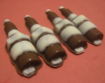 One dozen chocolate spark plug candies