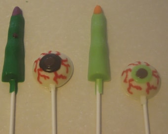 One dozen spooky eyes and witch finger lollipop suckers Halloween party favors