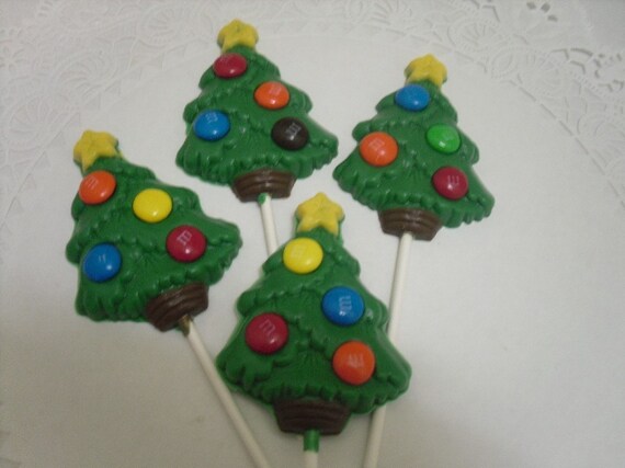 A dozen large Christmas tree lollipops