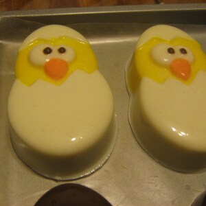 One dozen chick popping out of an egg chocolate covered sandwich cookie imagem 2