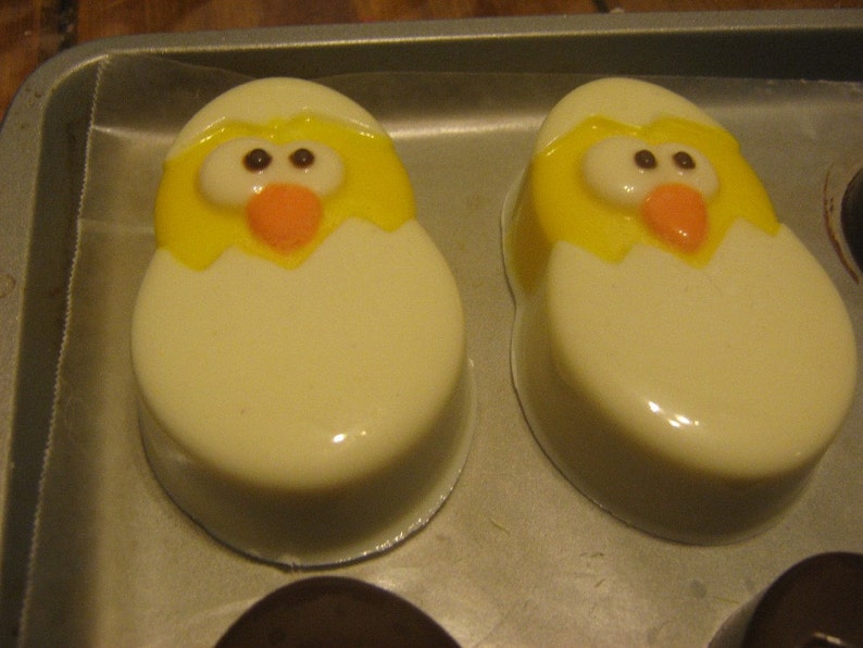 One dozen chick popping out of an egg chocolate covered sandwich cookie imagem 2