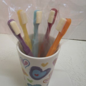Half a dozen adult size chocolate toothbrushes image 1