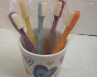 Half a dozen adult size chocolate toothbrushes