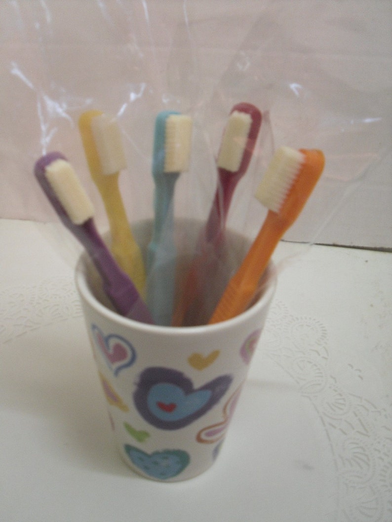 Half a dozen adult size chocolate toothbrushes image 1