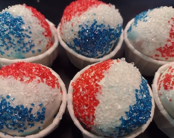 One dozen red white and blue snow-cone themed sandwich cookie balls party favors