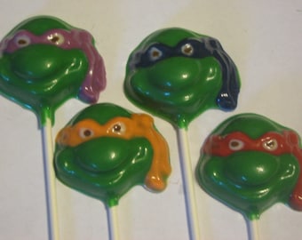 One dozen masked turtle lollipop sucker party favors
