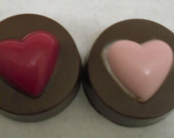 One dozen Heart topped Chocolate Covered Double Stuffed Oreos