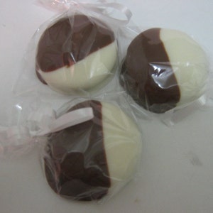 One dozen chocolate covered oreos with look of black and white cookies image 2