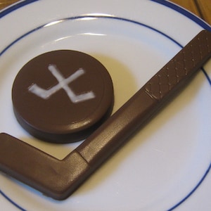 Solid chocolate hockey stick and hockey puck image 1