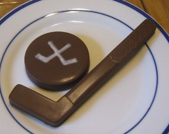 Solid chocolate hockey stick and hockey puck