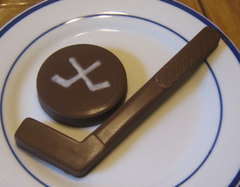 Solid chocolate hockey stick and hockey puck image 1