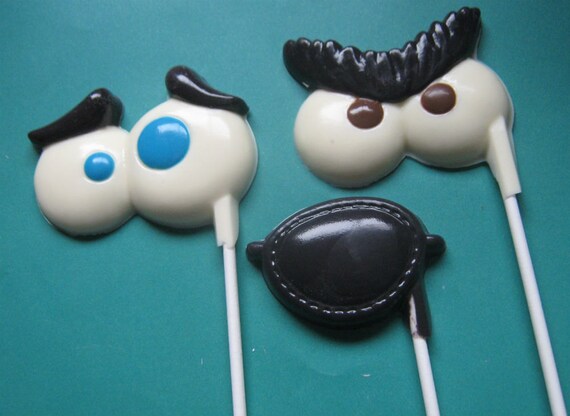 One dozen eyeballs and eye patch suckers lollipops party favors
