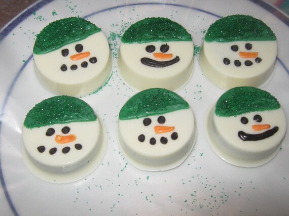 One dozen chocolate covered oreo snowmen