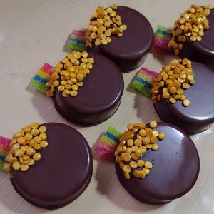 One dozen pot of gold at the end of the rainbow chocolate covered oreo sandwich cookie party favors